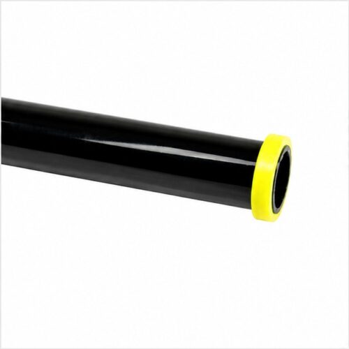 Close up of a black cylindrical pipe with a yellow end ring on a white background